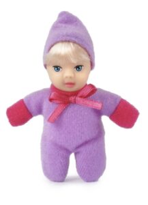 Vista frontal e traseira da caixa rosa de Páscoa Kopenhagen Fofolete. A frente exibe um ovo de chocolate de 120g e três janelas mostrando as bonecas em suas caixinhas individuais. O verso apresenta as três bonecas Fofolete (rosa, roxa e azul) fora da embalagem com o texto "Uma gracinha!".