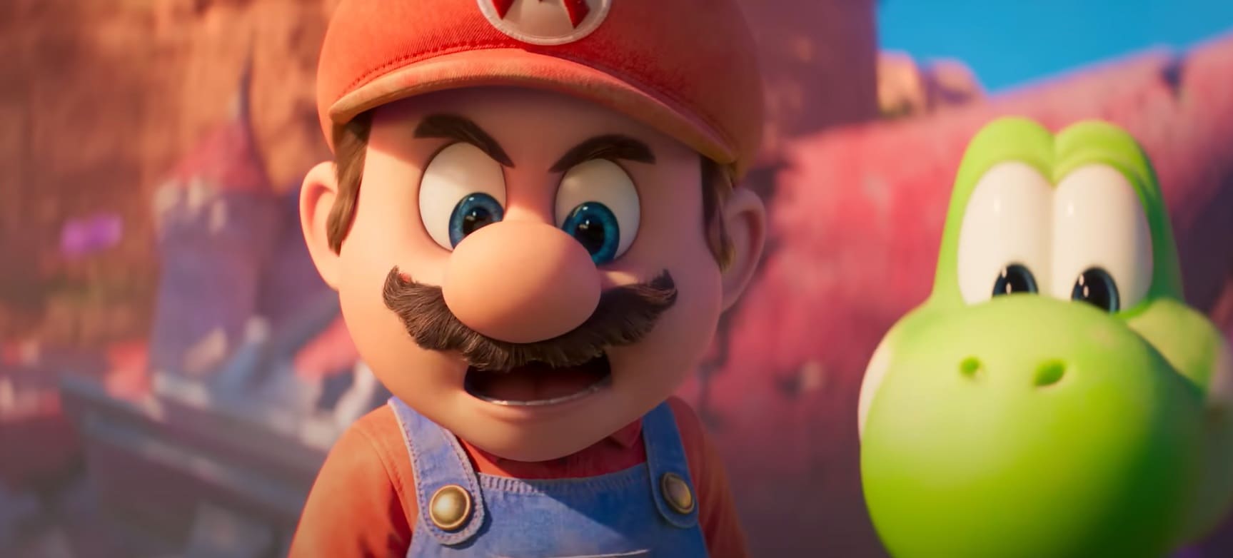 Close-up de Mario com expressão de surpresa e determinação, ao lado de um Yoshi verde, em um cenário ensolarado do Reino Cogumelo.