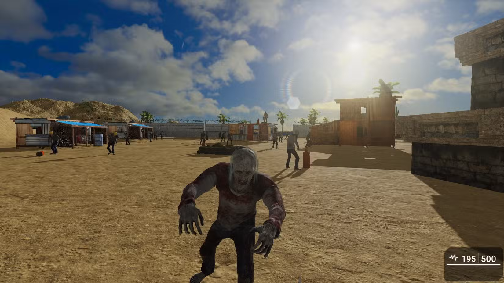 Captura de tela em primeira pessoa de um videogame de sobrevivência. Um zumbi pálido e ensanguentado caminha em direção ao jogador em um cenário desértico com construções simples de madeira, sob um céu ensolarado.