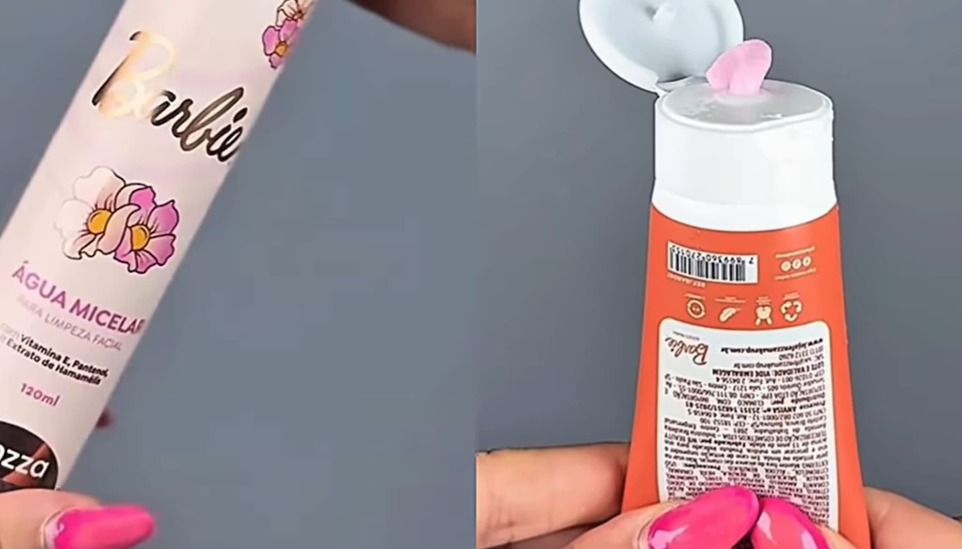 Close de uma bisnaga de creme da linha Barbie sendo pressionada, revelando um conteúdo de cor rosa claro.