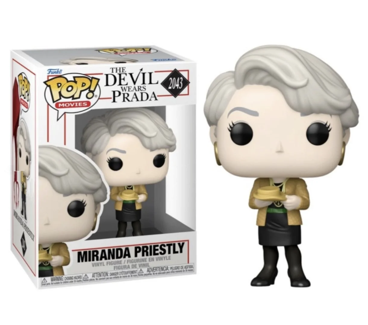 A caixa oficial da Funko Pop! Movies e o boneco de Miranda Priestly (número 2043) de O Diabo Veste Prada. A caixa mostra o título do filme e a ilustração. Miranda, fora da caixa, tem seu cabelo prateado e segura uma xícara de chá amarela com pires, usando sua jaqueta dourada.