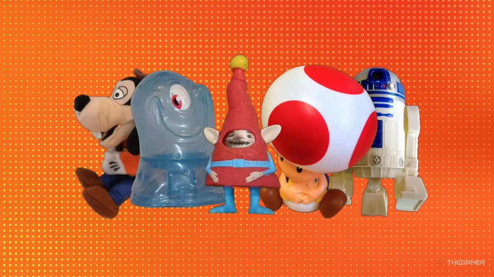 Uma foto de estúdio com cinco brinquedos do McDonald's Happy Meal em um fundo laranja pontilhado: Pateta, um fantasma azul, um gnomo, o cogumelo Toad e o R2-D2.