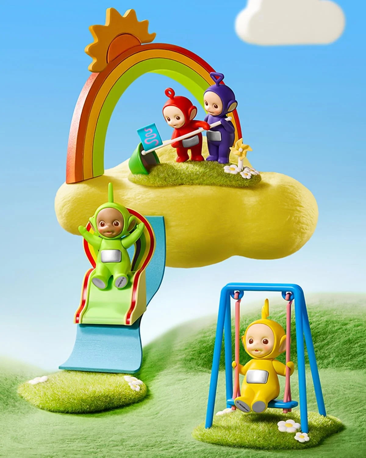 Blind box dos Teletubbies da Miniso com personagens em escorregador, balanço e arco-íris decorativo.