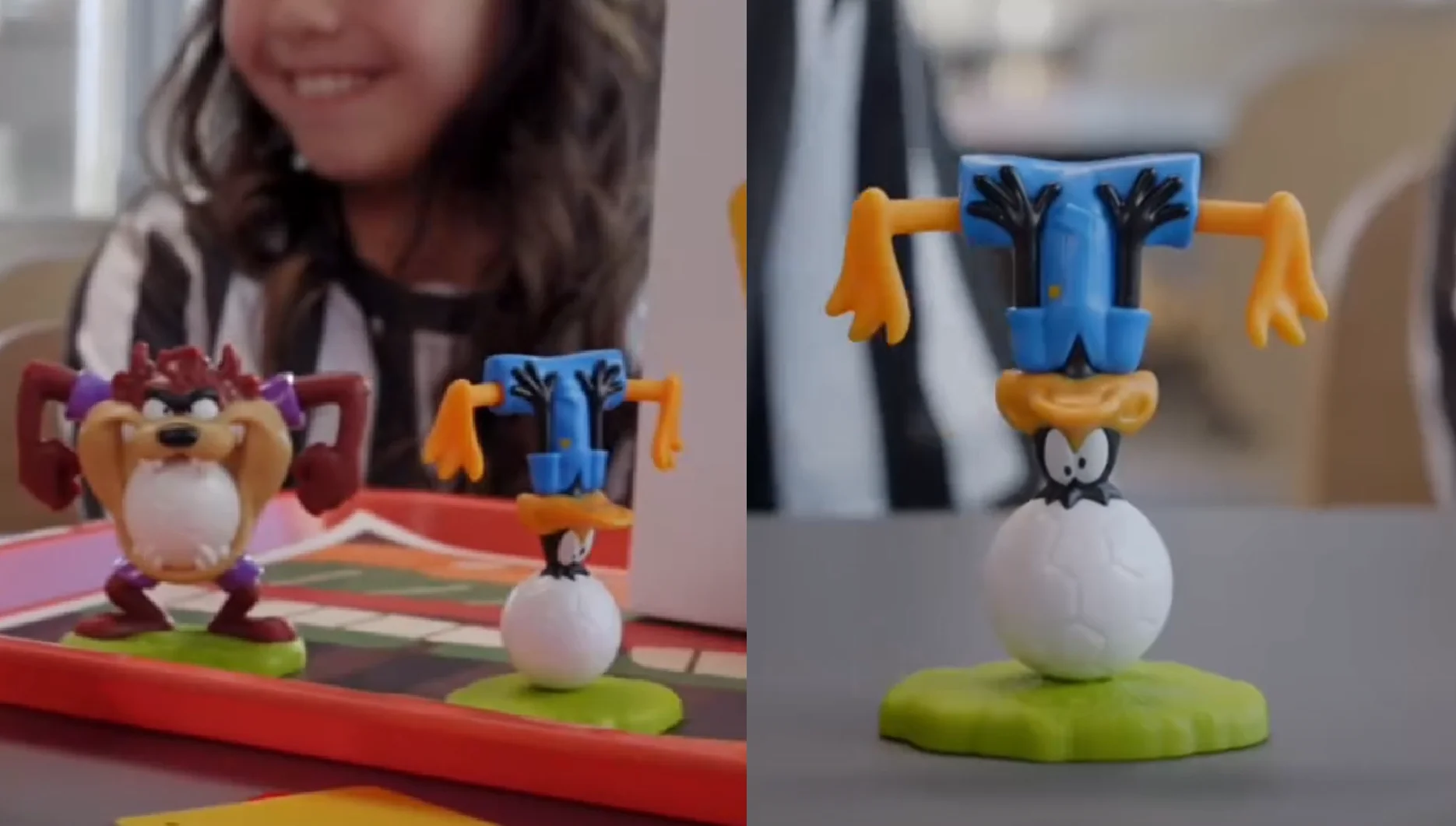 Personagens dos Looney Tunes em miniaturas colecionáveis com temática de futebol sobre uma mesa de jogo infantil.