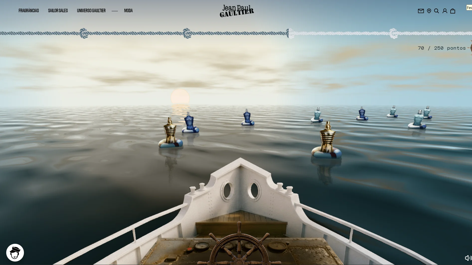 Cena do jogo digital da Jean Paul Gaultier com barco navegando entre frascos de perfume no mar.