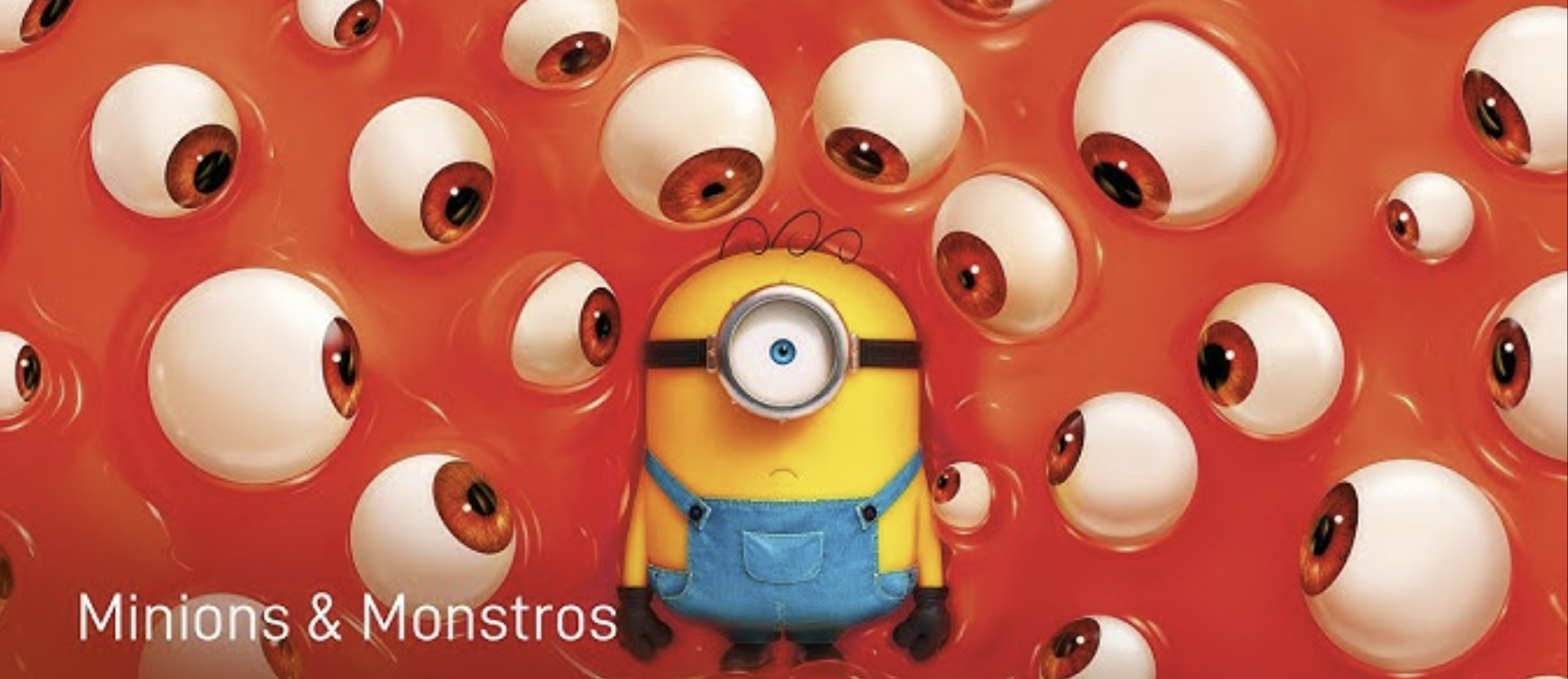 Cartaz de “Minions & Monstros” mostra um Minion cercado por olhos gigantes vermelhos em fundo laranja.