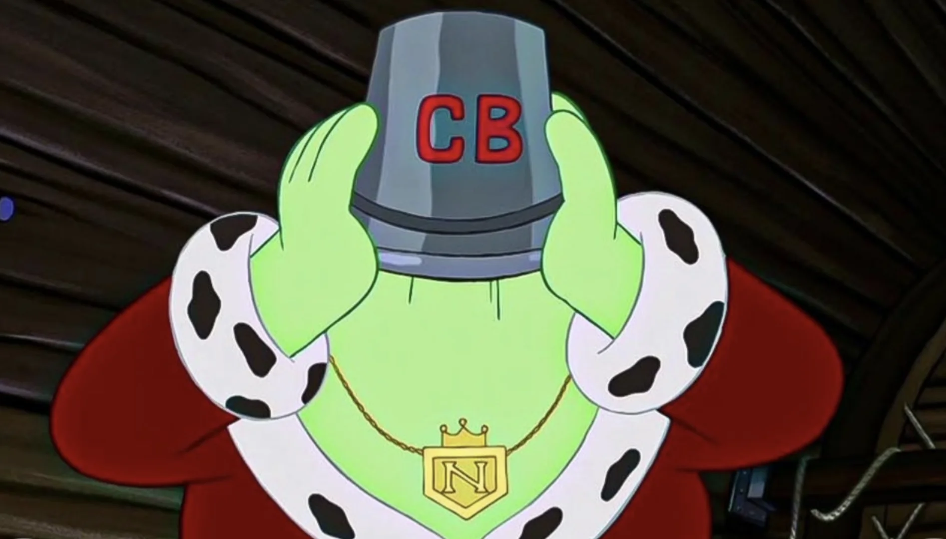 Rei Netuno aparece usando um balde na cabeça em uma cena de Bob Esponja: O Filme.