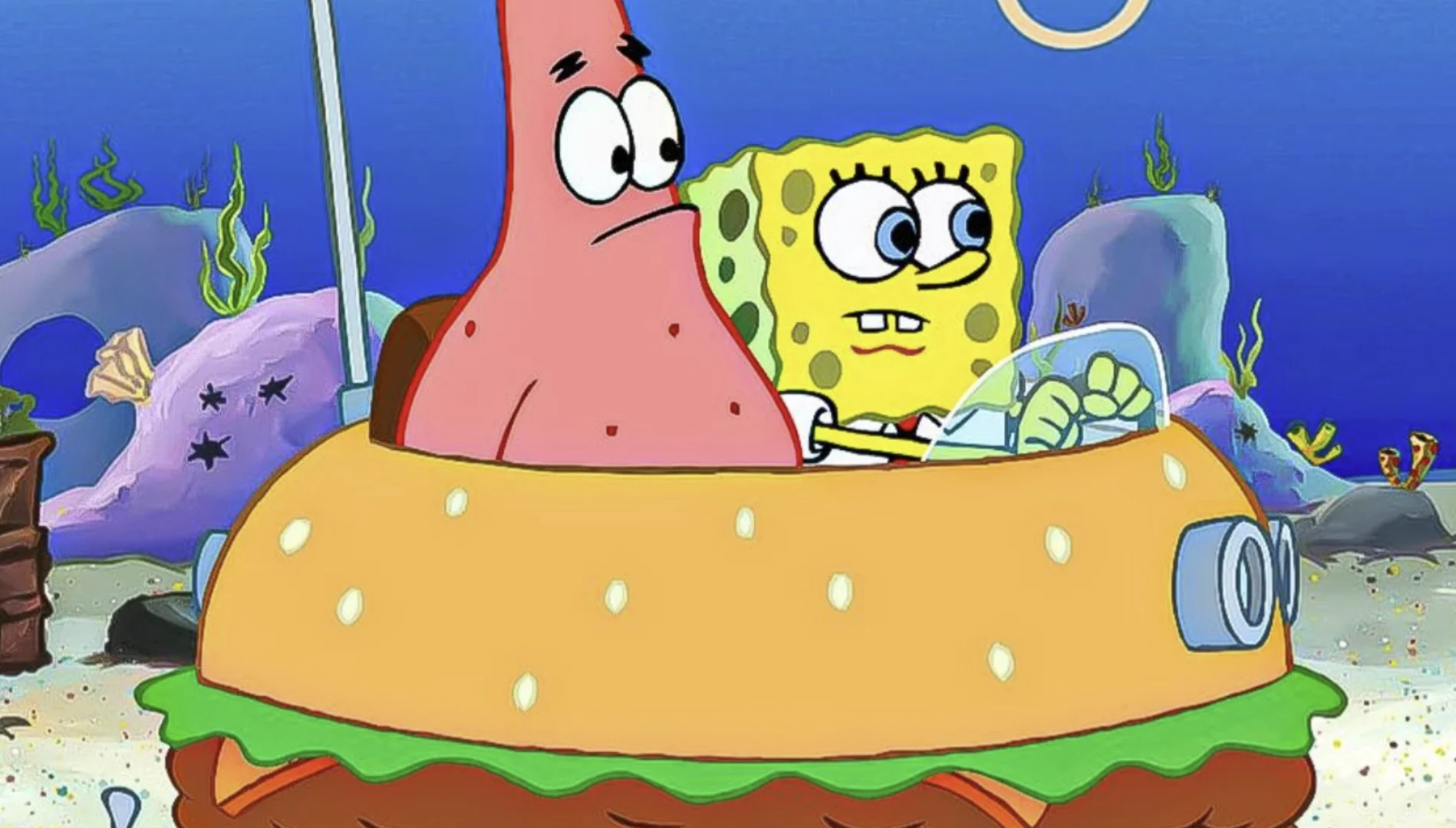 Bob Esponja e Patrick viajam no Patty Wagon durante uma cena do primeiro filme.