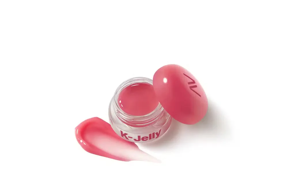Balm multifuncional Avon Sweets K-Jelly aberto apresenta textura em gel rosa com acabamento brilhante.